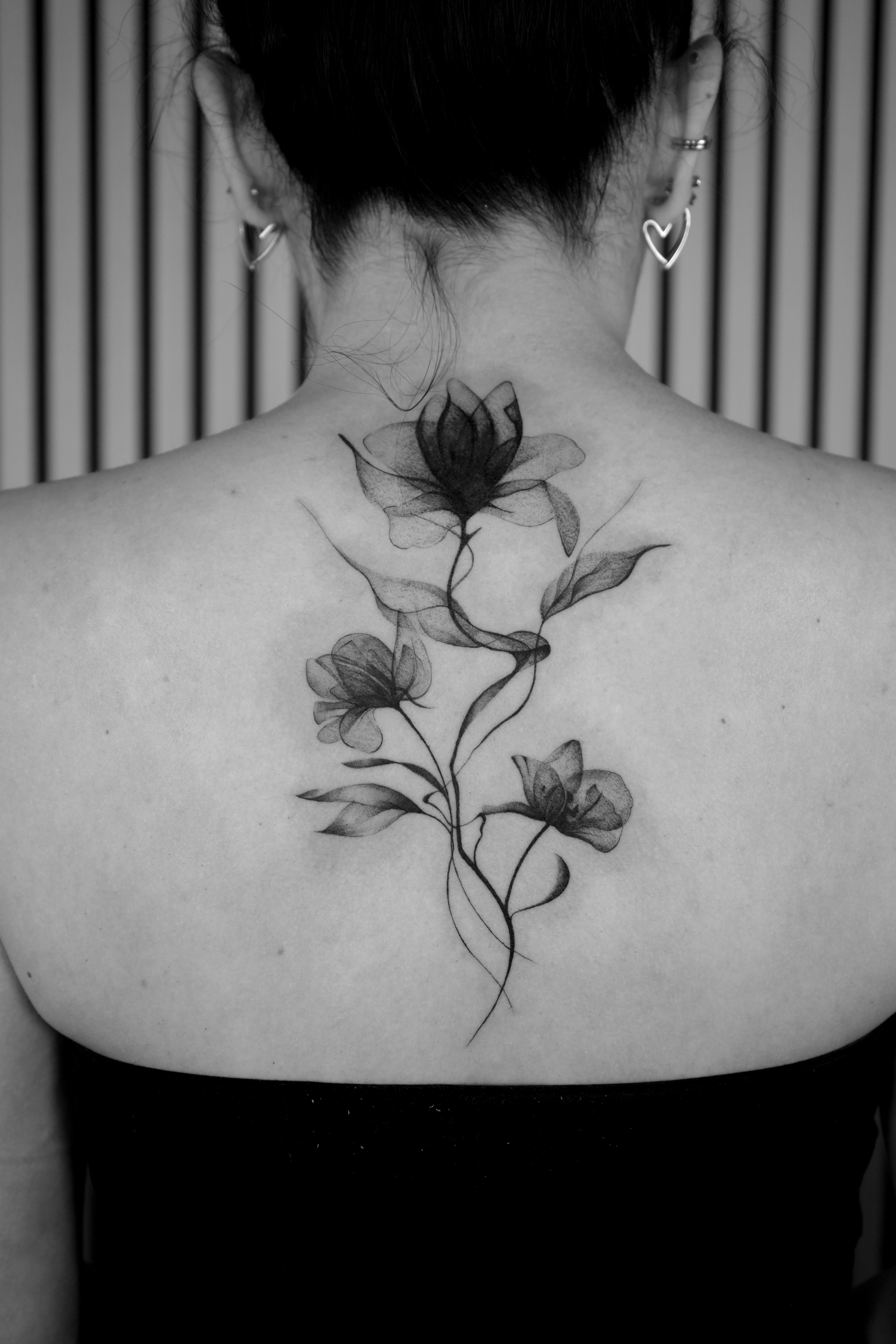 Fine line floral spine